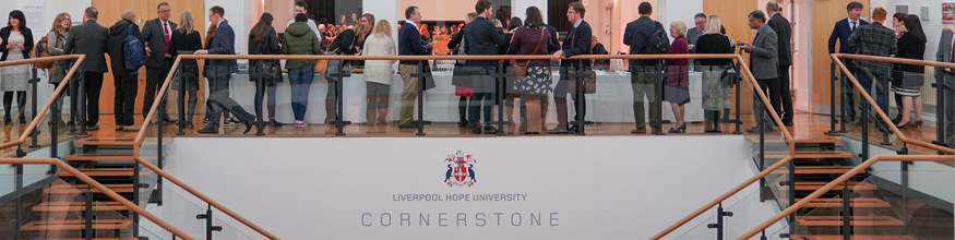 staff shot on the cornerstone building balcony